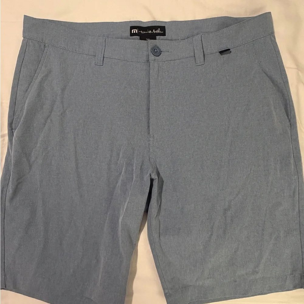 Travis Mathew “Beck” Light Blue Flat-Front Performance Shorts